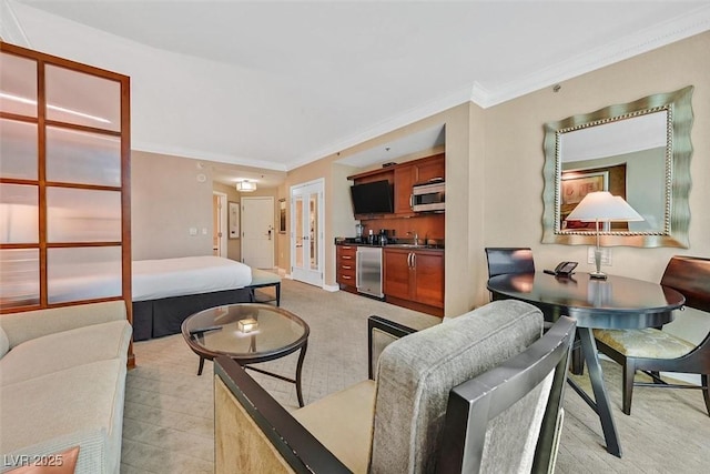 135 E Harmon Ave Unit 1403, Las Vegas, NV 89109 - living area featuring crown molding and light carpet