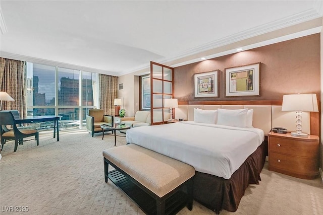 135 E Harmon Ave Unit 1403, Las Vegas, NV 89109 - bedroom with light carpet, expansive windows, and crown molding