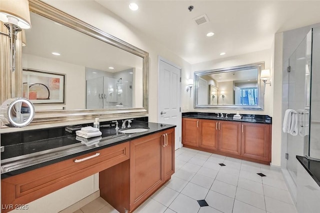 135 E Harmon Ave Unit 1403, Las Vegas, NV 89109 - full bath featuring a stall shower, vanity, tile patterned floors, and recessed lighting