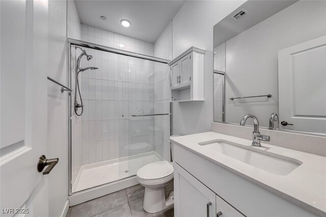 1038 Delbrook Ave, Henderson, NV 89012 - full bathroom with toilet, a stall shower, tile patterned floors, and vanity
