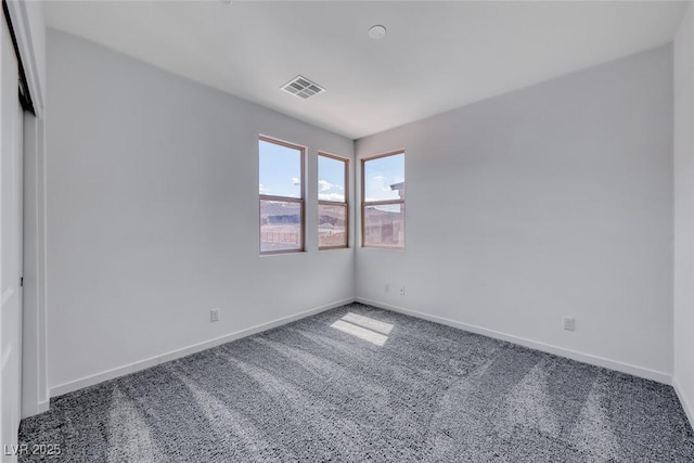 1038 Delbrook Ave, Henderson, NV 89012 - unfurnished room with carpet and baseboards