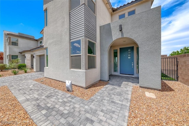 1038 Delbrook Ave, Henderson, NV 89012 - property entrance with stucco siding