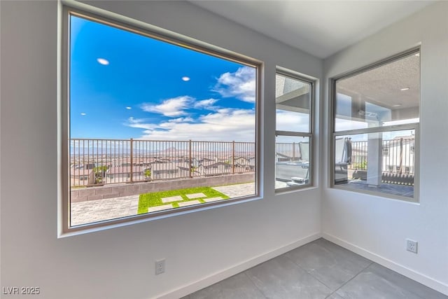 1038 Delbrook Ave, Henderson, NV 89012 - spare room featuring baseboards