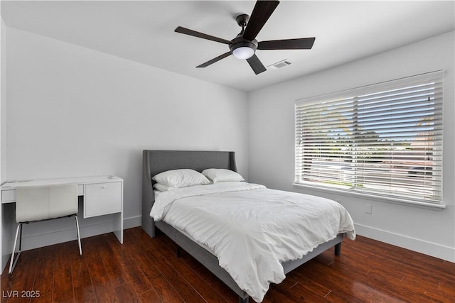2250 Bowie Cir, Henderson, NV 89014 - bedroom with baseboards, wood finished floors, and ceiling fan