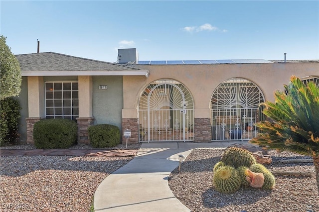 1912 Parkchester Dr, Las Vegas, NV 89108 - doorway to property with stucco siding