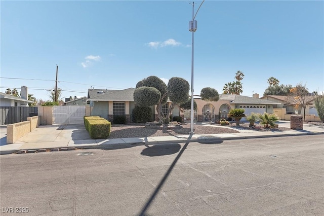 1912 Parkchester Dr, Las Vegas, NV 89108 - view of front facade featuring a gate