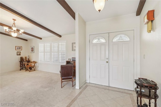 1912 Parkchester Dr, Las Vegas, NV 89108 - foyer entrance featuring beamed ceiling, a chandelier, and light tile patterned floors