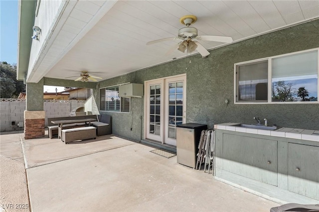 1912 Parkchester Dr, Las Vegas, NV 89108 - view of patio featuring ceiling fan and a sink