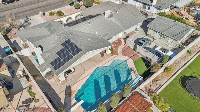 1912 Parkchester Dr, Las Vegas, NV 89108 - aerial view of residential area featuring a pool area