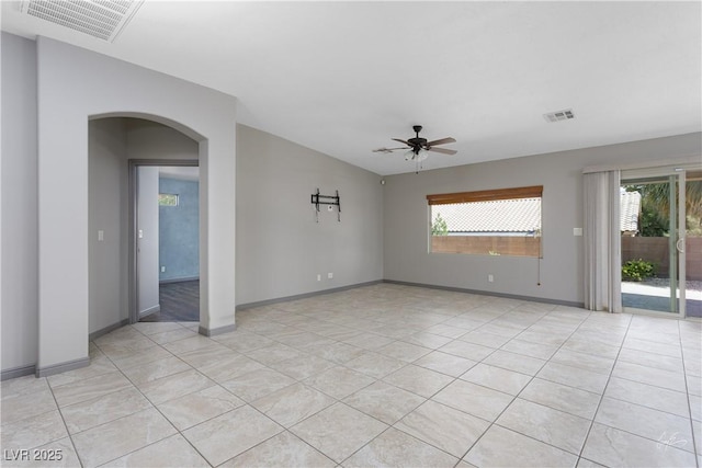 854 Santa Maria Way, Mesquite, NV 89027 - spare room featuring a ceiling fan, plenty of natural light, light tile patterned flooring, and arched walkways