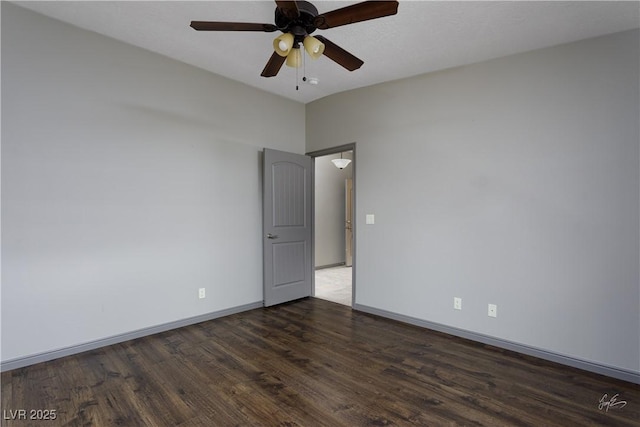 854 Santa Maria Way, Mesquite, NV 89027 - empty room with dark wood-style floors, baseboards, a ceiling fan, and lofted ceiling