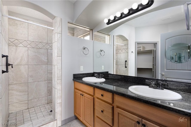 854 Santa Maria Way, Mesquite, NV 89027 - bathroom with a stall shower, double vanity, and a spacious closet