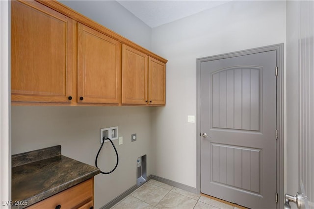 854 Santa Maria Way, Mesquite, NV 89027 - laundry room with cabinet space, electric dryer hookup, hookup for a washing machine, light tile patterned floors, and baseboards