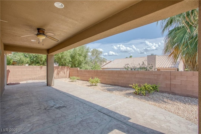 854 Santa Maria Way, Mesquite, NV 89027 - fenced backyard with ceiling fan and a patio