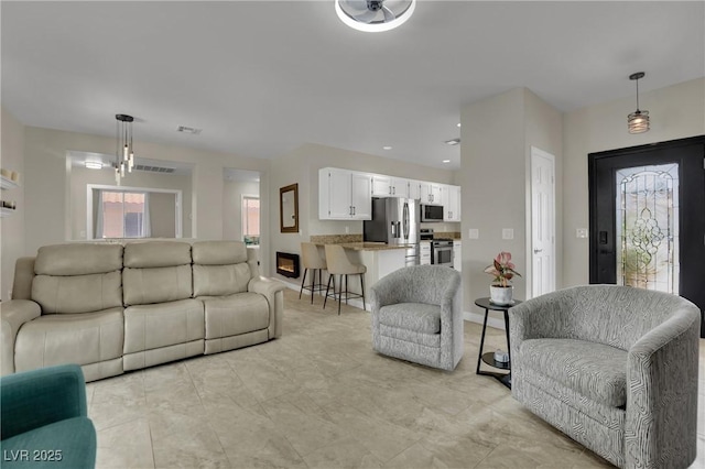 2558 Wiltshire Ave, Henderson, NV 89052 - living room with baseboards