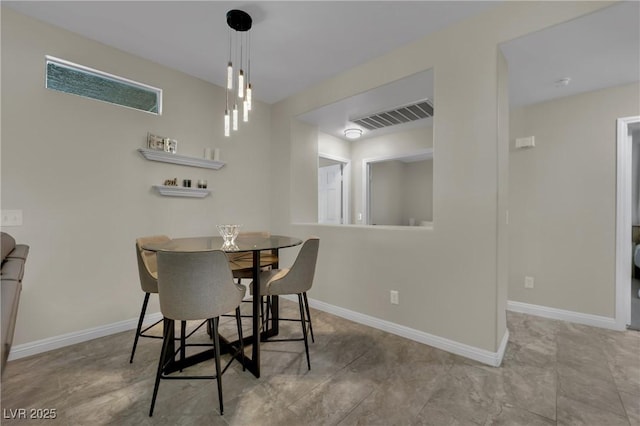 2558 Wiltshire Ave, Henderson, NV 89052 - dining area featuring baseboards
