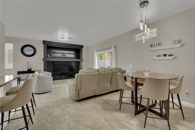 2558 Wiltshire Ave, Henderson, NV 89052 - dining room featuring baseboards