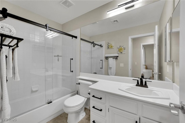 2558 Wiltshire Ave, Henderson, NV 89052 - bathroom featuring vanity, toilet, and combined bath / shower with glass door