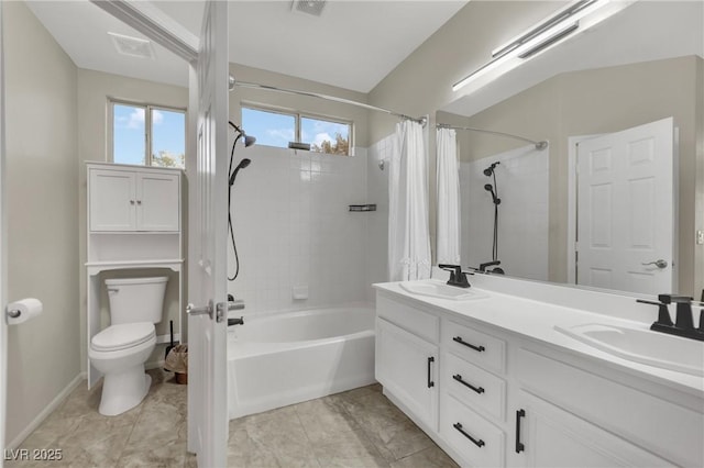 2558 Wiltshire Ave, Henderson, NV 89052 - full bathroom with shower / bath combination with curtain, toilet, double vanity, and baseboards