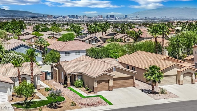 2558 Wiltshire Ave, Henderson, NV 89052 - aerial perspective of suburban area featuring a mountain backdrop