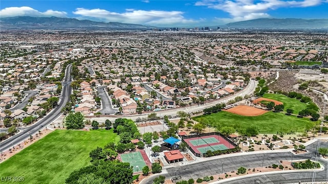 2558 Wiltshire Ave, Henderson, NV 89052 - aerial perspective of suburban area with a mountain backdrop