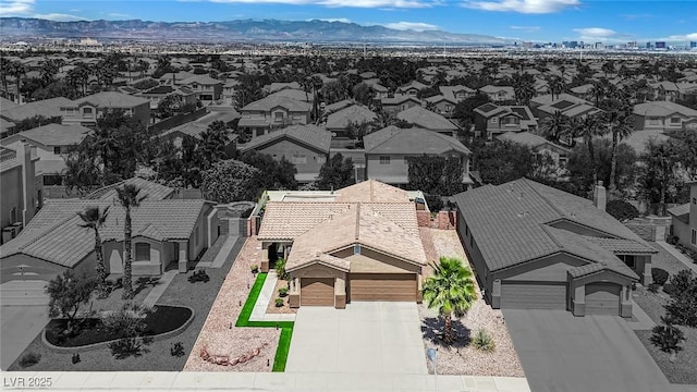 2558 Wiltshire Ave, Henderson, NV 89052 - aerial perspective of suburban area featuring a mountain backdrop
