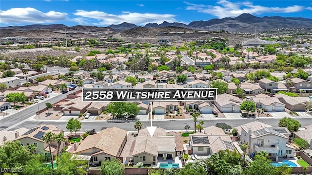 2558 Wiltshire Ave, Henderson, NV 89052 - aerial view of residential area with a mountain backdrop