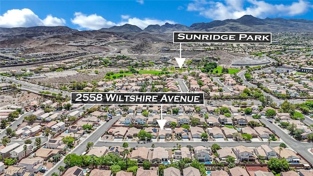 2558 Wiltshire Ave, Henderson, NV 89052 - aerial perspective of suburban area with mountains