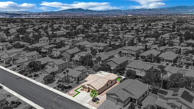 2558 Wiltshire Ave, Henderson, NV 89052 - aerial perspective of suburban area featuring a mountain backdrop