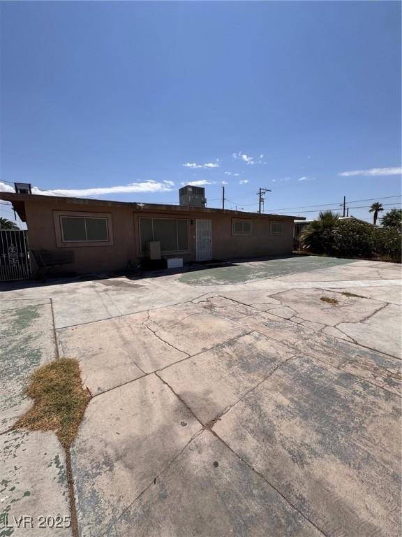 2604 Webster St, North Las Vegas, NV 89030 - rear view of property featuring a patio and stucco siding