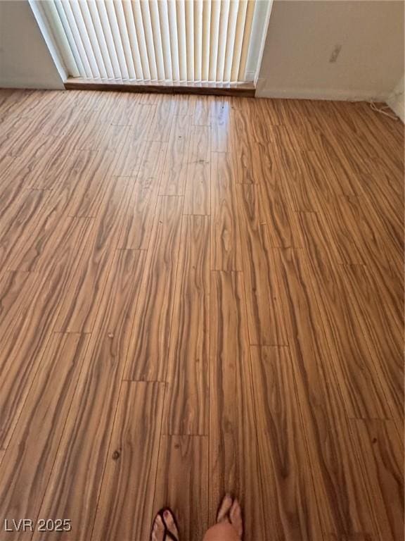 2604 Webster St, North Las Vegas, NV 89030 - detailed view of wood finished floors and baseboards