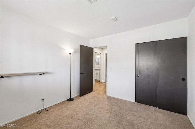 1251 Los Meadows Dr, Las Vegas, NV 89110 - unfurnished bedroom featuring carpet and a closet