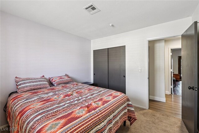 1251 Los Meadows Dr, Las Vegas, NV 89110 - bedroom with a closet and light carpet
