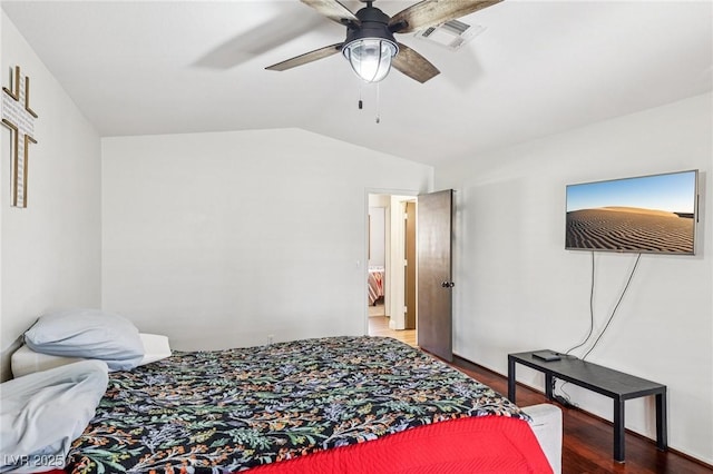 1251 Los Meadows Dr, Las Vegas, NV 89110 - bedroom with wood finished floors, lofted ceiling, and ceiling fan