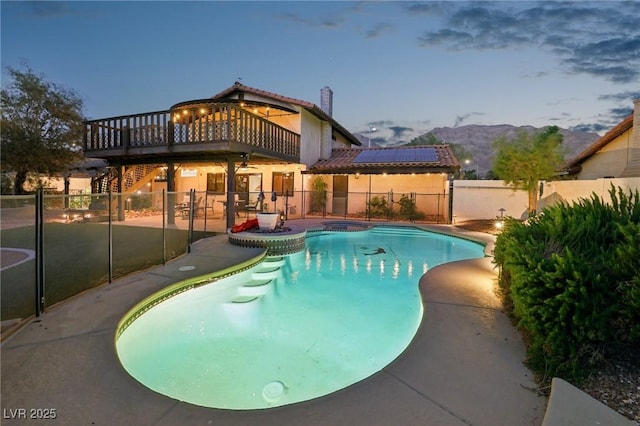 1251 Los Meadows Dr, Las Vegas, NV 89110 - view of swimming pool with a fenced backyard, a deck with mountain view, a patio area, and stairway