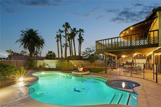 1251 Los Meadows Dr, Las Vegas, NV 89110 - view of swimming pool featuring a fenced backyard, a patio area, a pool with connected hot tub, stairway, and a deck