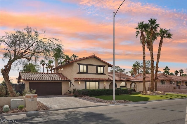 1251 Los Meadows Dr, Las Vegas, NV 89110 - view of front facade with stucco siding, a tiled roof, a garage, driveway, and a front lawn