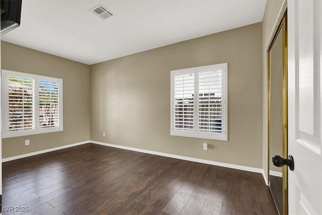 3204 Rutledge Dr, Las Vegas, NV 89120 - spare room with dark wood finished floors and baseboards