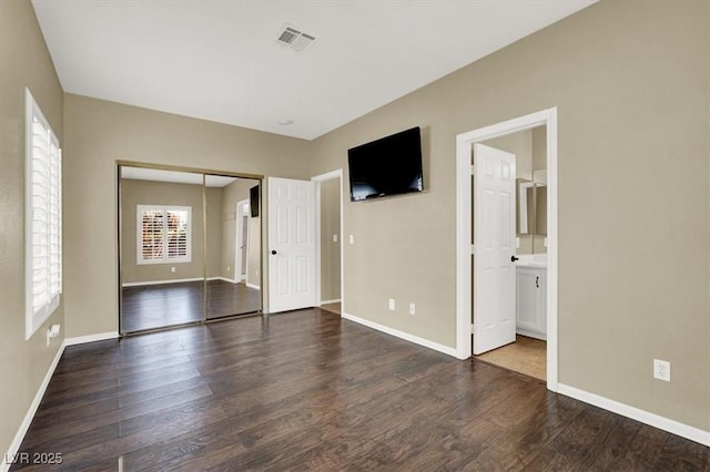 3204 Rutledge Dr, Las Vegas, NV 89120 - unfurnished bedroom featuring wood finished floors, baseboards, and a closet