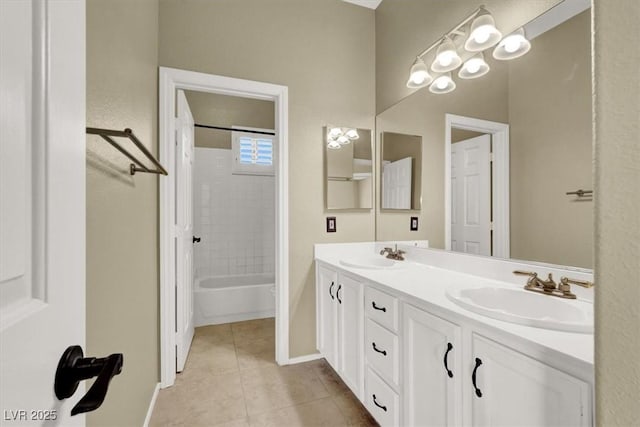 3204 Rutledge Dr, Las Vegas, NV 89120 - bathroom with double vanity, tile patterned flooring, baseboards, and shower / tub combination