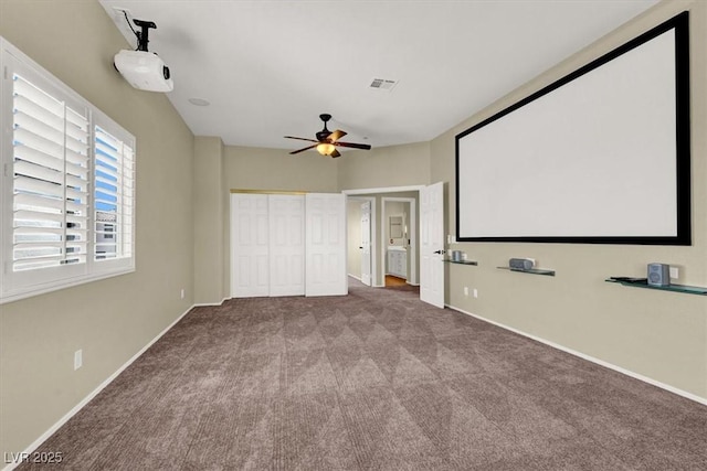 3204 Rutledge Dr, Las Vegas, NV 89120 - carpeted home theater featuring ceiling fan and baseboards