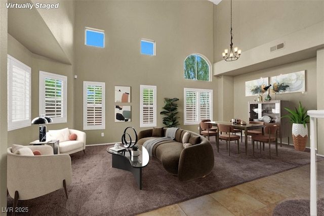 3204 Rutledge Dr, Las Vegas, NV 89120 - carpeted living area featuring a chandelier, a high ceiling, and baseboards