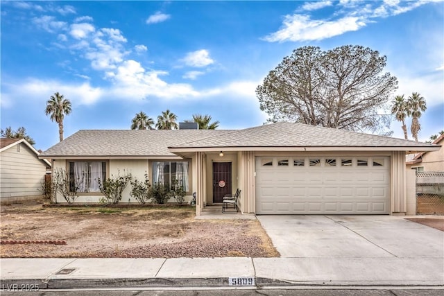 5809 Robin Ln, Las Vegas, NV 89108 - ranch-style house with concrete driveway and a garage