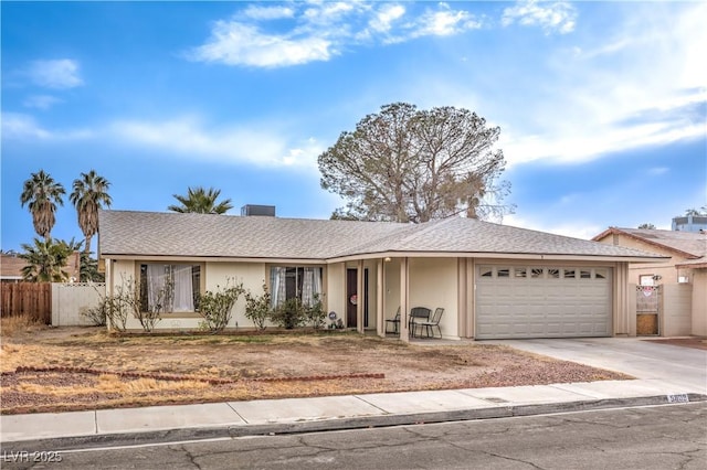 5809 Robin Ln, Las Vegas, NV 89108 - ranch-style house featuring a garage and driveway