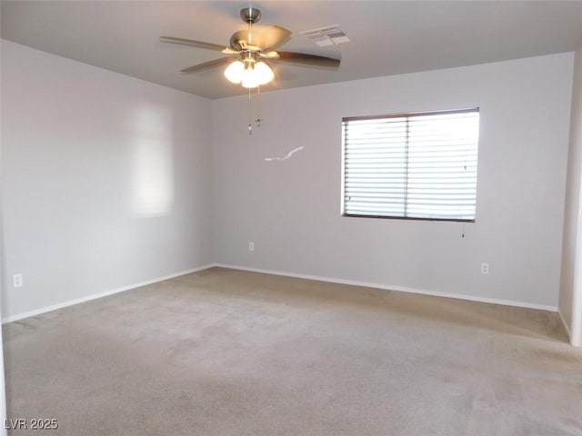 2905 Shimmering Bay St, Laughlin, NV 89029 - spare room with carpet, a ceiling fan, and baseboards
