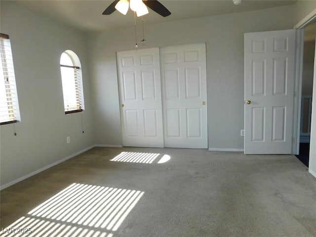 2905 Shimmering Bay St, Laughlin, NV 89029 - unfurnished bedroom with carpet floors, baseboards, and a ceiling fan