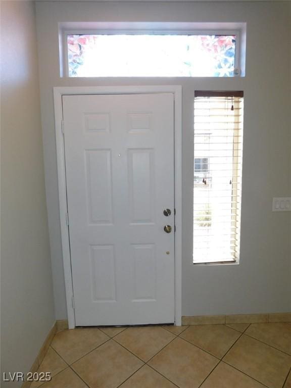 2905 Shimmering Bay St, Laughlin, NV 89029 - entryway with baseboards and light tile patterned floors