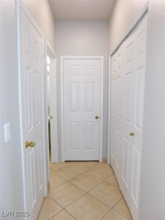 2905 Shimmering Bay St, Laughlin, NV 89029 - hallway featuring light tile patterned flooring