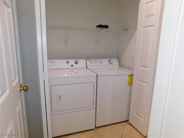 2905 Shimmering Bay St, Laughlin, NV 89029 - laundry room featuring washer and dryer and light tile patterned flooring