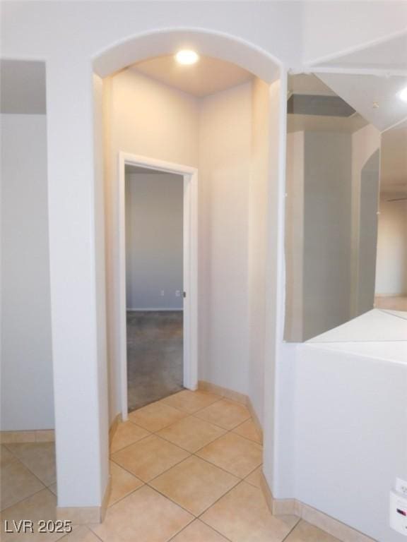 2905 Shimmering Bay St, Laughlin, NV 89029 - hall featuring arched walkways and light tile patterned floors